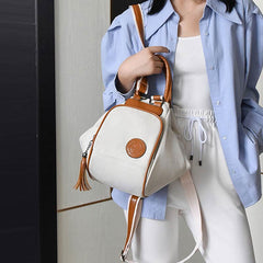 Multifunctional Women's Backpack with Tassel Decor – Durable Canvas Travel Daypack