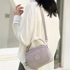 Small Nylon Crossbody Bag for Women – Triple Compartment Travel Purse