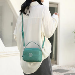 Small Nylon Crossbody Bag for Women – Triple Compartment Travel Purse