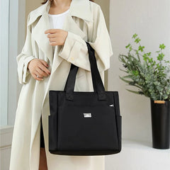 Lightweight, waterproof nylon shoulder bag