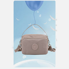 Small Nylon Crossbody Bag for Women – Triple Compartment Travel Purse