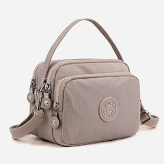 Small Nylon Crossbody Bag for Women – Triple Compartment Travel Purse